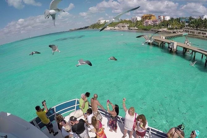 Catamaran Adventure Tour Isla Mujeres Unlimited from Cancun with Transportation - What the boat atmosphere is really like
