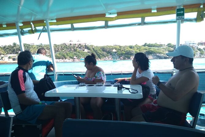 Catamaran Adventure Tour Isla Mujeres Unlimited from Cancun with Transportation - Snorkeling along the route
