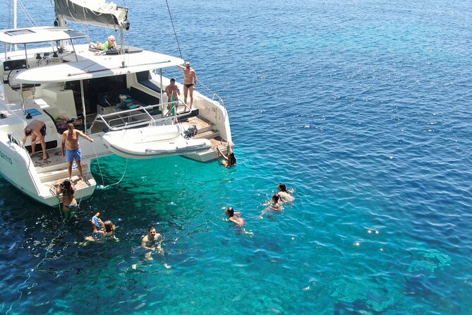 Catamaran Alghero, Catamaran Sailing Day Trip - A Sardinian lunch served on the catamaran