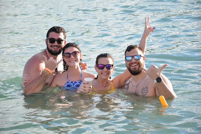 Catamaran Booze Cruise, Snorkeling & Punta Cana Coast View - Getting to the catamaran from Bavaro Beach