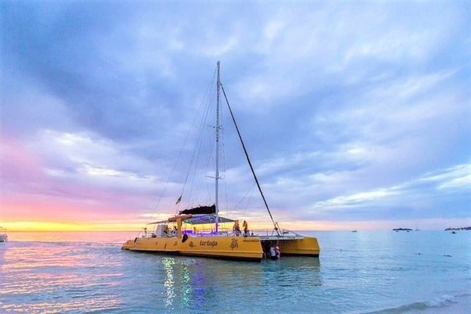 Catamaran Cruise Full Day Tour to Reef, Caves and Negril Beach - The real appeal: Negril by bus, boat, and sunset