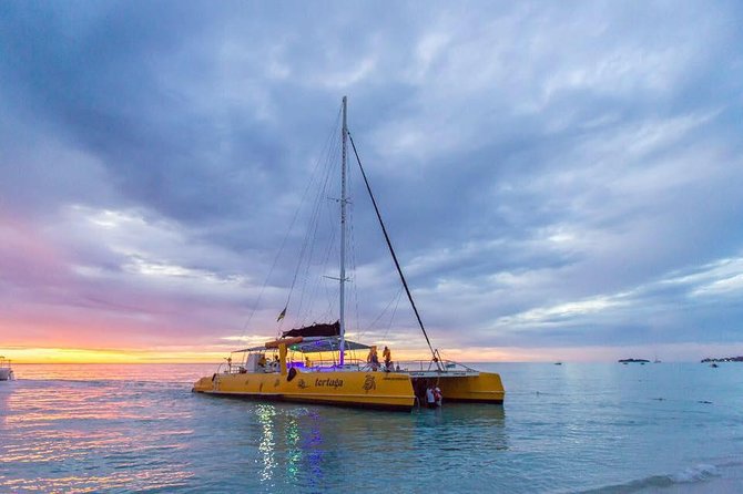 Catamaran Cruise Full Day Tour to Reef, Caves and Negril Beach - Adults-only and family-friendly sailing days