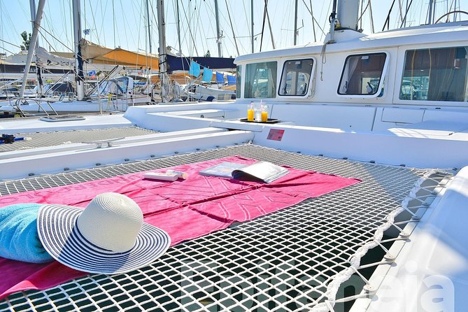 Catamaran cruise in Mykonos with Meal, Drinks & Transport - Little Venice, windmills, and the sunset route