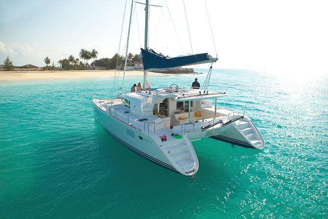 Catamaran cruise in Mykonos with Meal, Drinks & Transport - Swimming and snorkeling at Rhenia