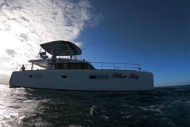 Catamaran Cruise with Snorkeling and lunch on board! - Boarding the 52-foot Lagoon catamaran at Sosúa Beach