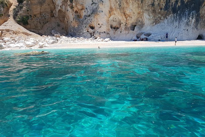 Catamaran Day Trip to the Cale di Orosei with Lunch - Cala Birìala brings a greener coastal view