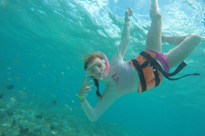 Catamaran Group Sightseeing, Snorkeling Tour Isla Mujeres - Lunch, drinks, and the mood on board