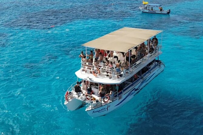 Catamaran in Cozumel with snorkeling at El Cielo and open Bar - Boarding at 1:00 PM in central Cozumel