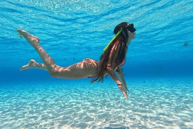 Catamaran in Cozumel with snorkeling at El Cielo and open Bar - Open bar, music, and the onboard meal