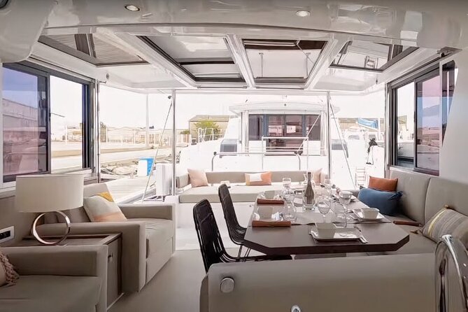 CATAMARAN Kleftiko Poliegos & Round of Milos Lunch with Openbar - Kalogries Beach and the first swim