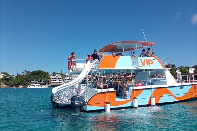Catamaran Party Cruise with Snorkeling & BBQ - Boarding the boat from the water