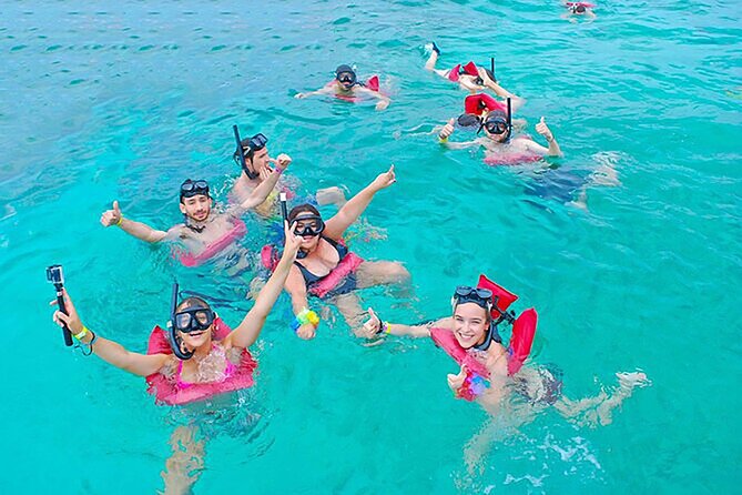 Catamaran Party in Punta Cana Includes Drink and Transportation - Punta de los Nidos: swimming, a slide, and easy water fun