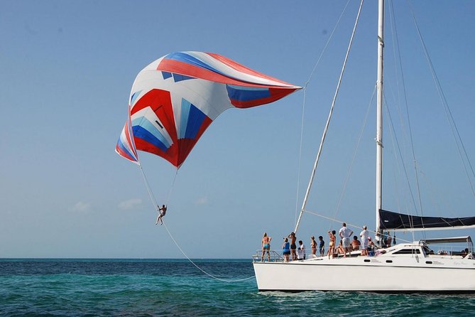Catamaran Party on the Caribbean Sea to Isla Mujeres - Snorkeling in calm Caribbean water