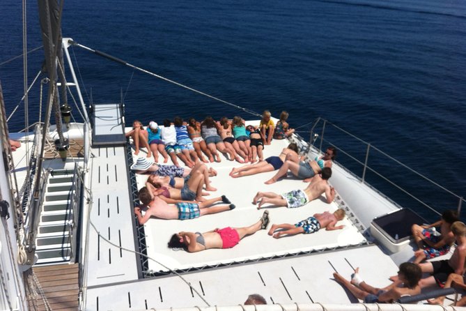 Catamaran ride -Costa Brava with barbecue and drinks. Familiar. - Leaving Lloret de Mar from the beach