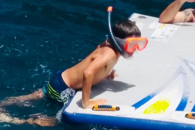 Catamaran ride -Costa Brava with barbecue and drinks. Familiar. - Music, dancing, and the social side