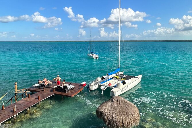 Catamaran Sailboat Bacalar Excursions - Cruising between Bacalar’s freshwater cenotes