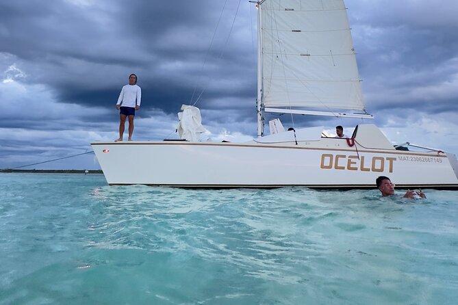 Catamaran Sailboat Bacalar Excursions - Swimming in Bacalar’s clear water