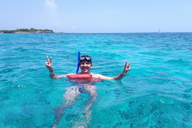 Catamaran Sailing and Snorkeling to Isla Mujeres from Cancun - Drinks, music, and the social mood