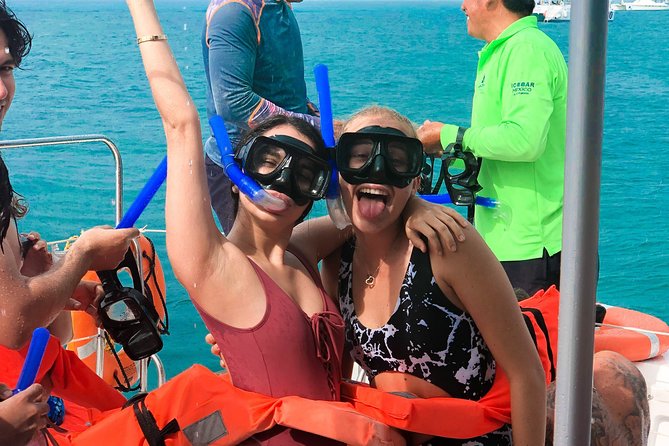 Catamaran Sailing to Isla Mujeres with Snorkeling, Lunch & Open Bar included - Beach-club time and the buffet lunch