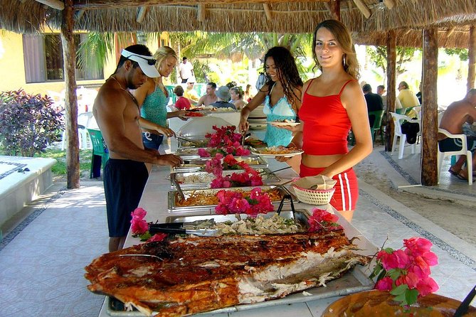 Catamaran Sailing to Isla Mujeres with Snorkeling, Lunch & Open Bar included - Open bar, boat atmosphere, and upgrades