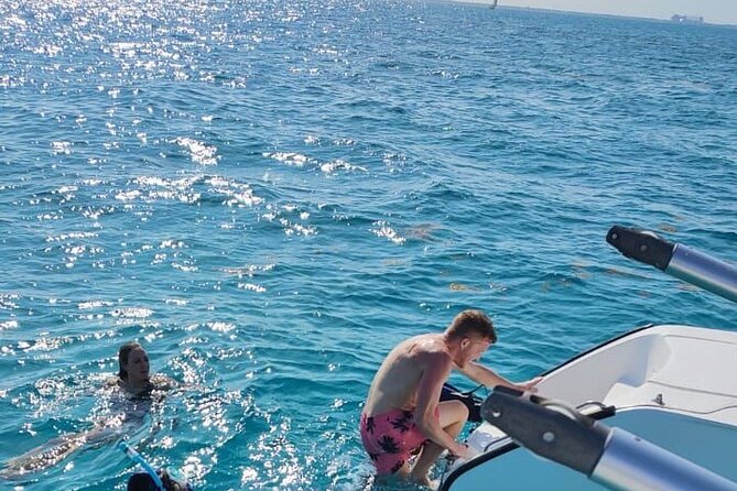 Catamaran sailing Tour to Isla Mujeres all inclusive - Isla Mujeres for shops, restaurants, and a change of pace