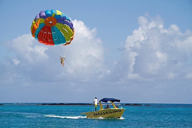 Catamaran to Ile aux Cerf with Parasailing, Tube Riding & Lunch - Tube riding and the optional underwater walk