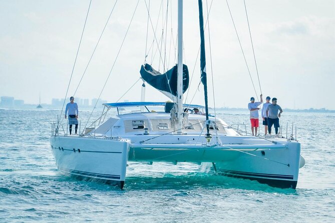 Catamaran to Isla Mujeres – Kids Go Free! (Only Pay Dock Fee) - Buffet lunch and drinks at the beach club