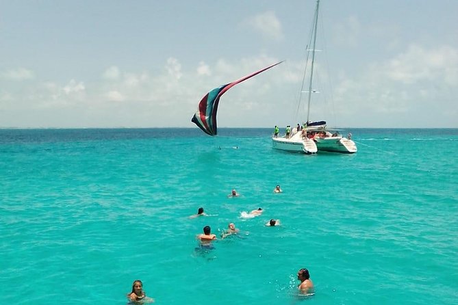 Catamaran to Isla Mujeres, Open bar, buffet, Beach Club Included - Sailing around Isla Mujeres to the west side