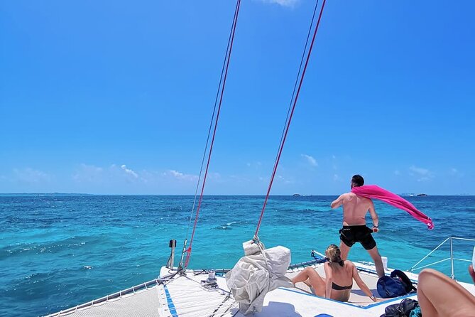 Catamaran to Isla Mujeres, Open bar, buffet, Beach Club Included - Reef snorkeling with a shared group