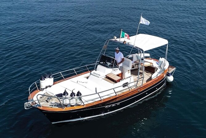Catamaran tour stops bathing and snorkeling toast with prosecco - From Cagliari’s port to the city’s historic waterfront