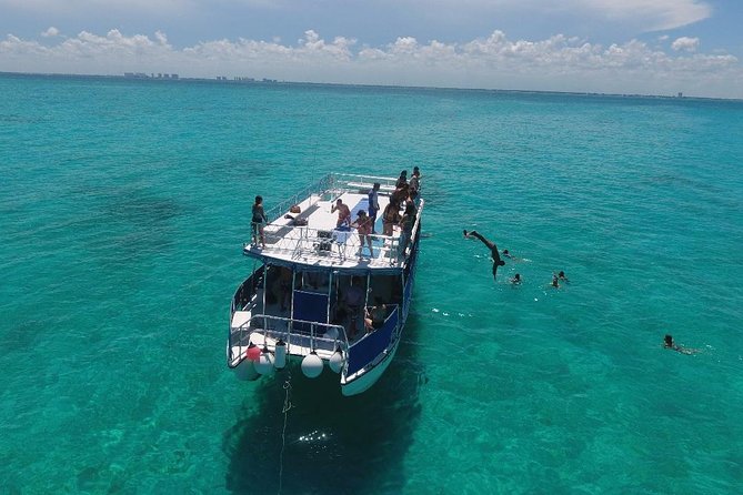 Catamaran Tour to Isla Mujeres all Included - Snorkeling at Maya Reef, when conditions allow