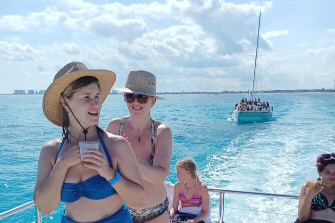 Catamaran Tour to Isla Mujeres all Included - Extra costs, meeting points, and timing