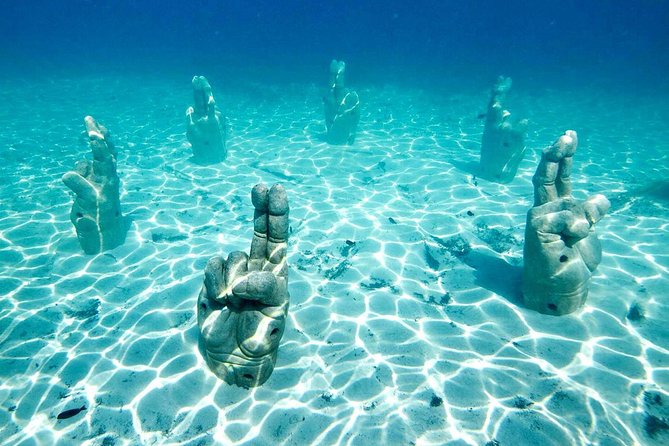 Catamaran Tour to Isla Mujeres from Cancun or Riviera Maya - Group atmosphere, language, and physical demands