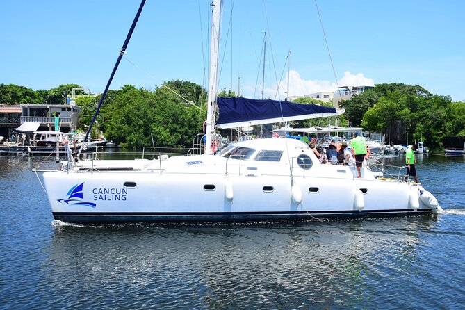 Catamaran Tour to Isla Mujeres, Open bar, Lunch, Snorkeling, Beach Club Included - Lunch at the beach club