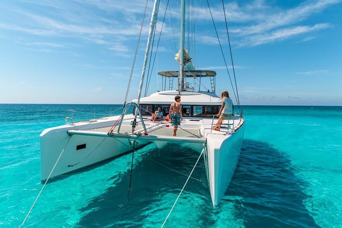 Catamaran Tour to Isla Mujeres, Open bar, Lunch, Snorkeling, Beach Club Included - Free time on Isla Mujeres