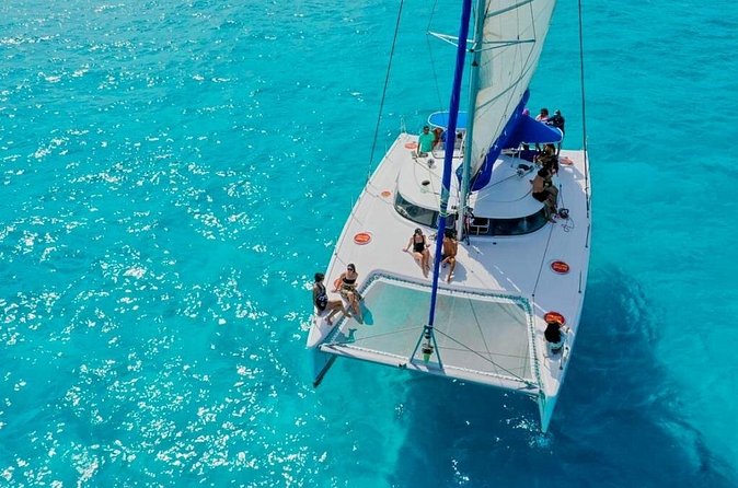 Catamaran Tour to Isla Mujeres Snorkeling with Buffet and Open Bar - Open bar, buffet, and the social side of the trip