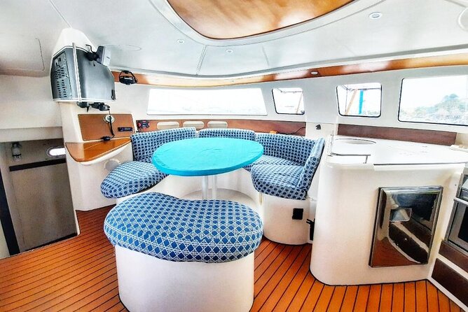 Catamaran Tour to Isla Mujeres Snorkeling with Buffet and Open Bar - Three hours to shape your own Isla Mujeres visit