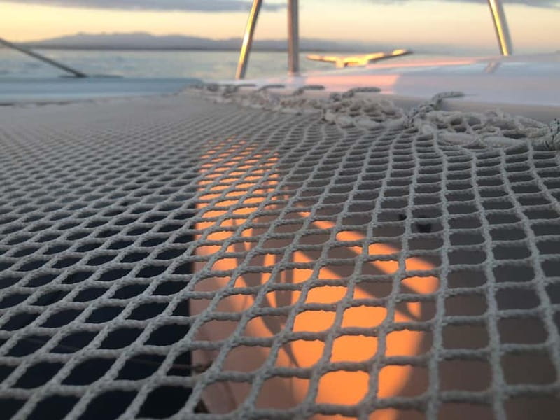 Catamaran trip to the Lavezzi Islands at sunset with snorkeling - Setting out from Piantarella Beach or Bonifacio