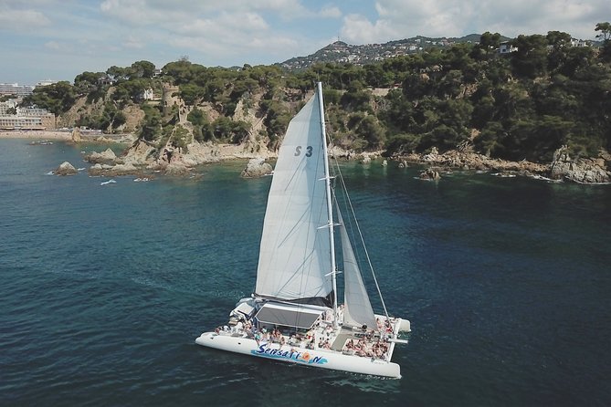 Catamaran trip with other groups along the Costa Brava. Saturday. - Anchoring near a Costa Brava cove