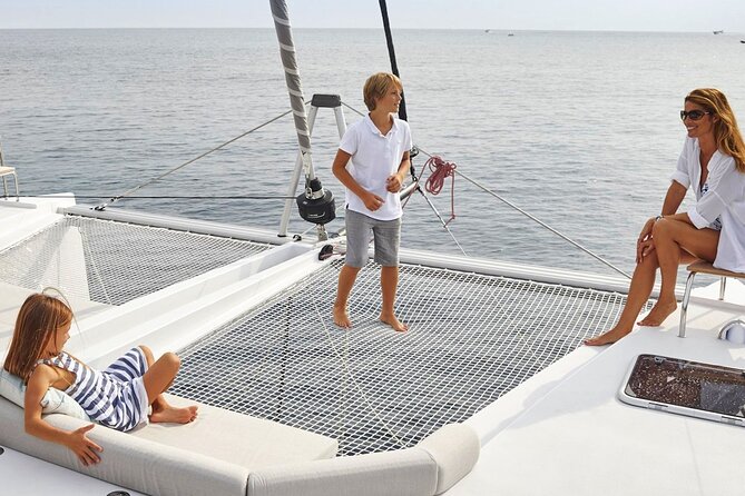 Chania: Private Day Catamaran Cruise with Swimming and Meal - Swimming, snorkeling, and SUP time