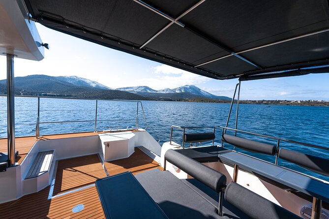 Comfort Max Catamaran Caldera Cruise with BBQ and Drinks - Sailing out of Ammoudi Bay