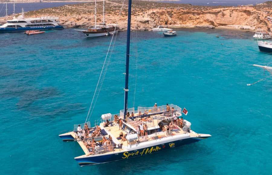 Comino: Blue Lagoon Catamaran Cruise with Lunch and Open Bar - The crew and the onboard setup