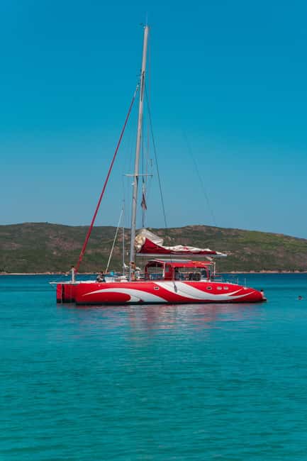 Cruising on a sailing maxi-catamaran - A long lunch stop near Lavezzi, Sperone, or Santa Manza