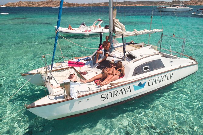 Daily cruise on a sailing catamaran on the La Maddalena archipelago - The first bay: a swim and a small aperitif