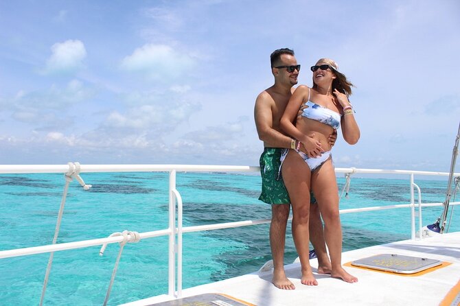 Deluxe Catamaran to Isla Mujeres with Open Bar from Cancun - Snorkeling in crowded Caribbean water
