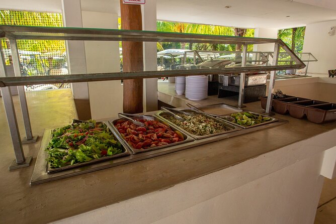Deluxe Catamaran tour to Isla Mujeres with Open Bar and Lunch - Lunch and downtime at Albatros Beach Club