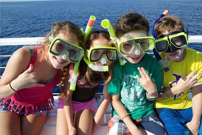 Deluxe Snorkel & Dolphin Watch Aboard a Luxury Catamaran from Kailua-Kona - More Than Snorkeling: Slide, Jump, Paddle, or Float