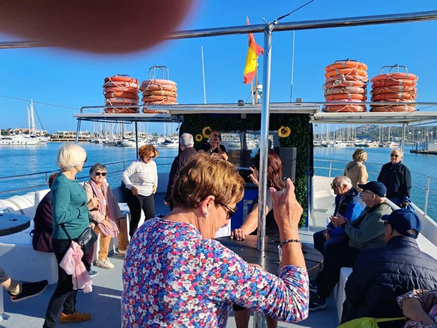 Denia: Cova tallada Catamaran Trip w/ Mussel Tasting & Wine - Mussels, white wine, and a short pause