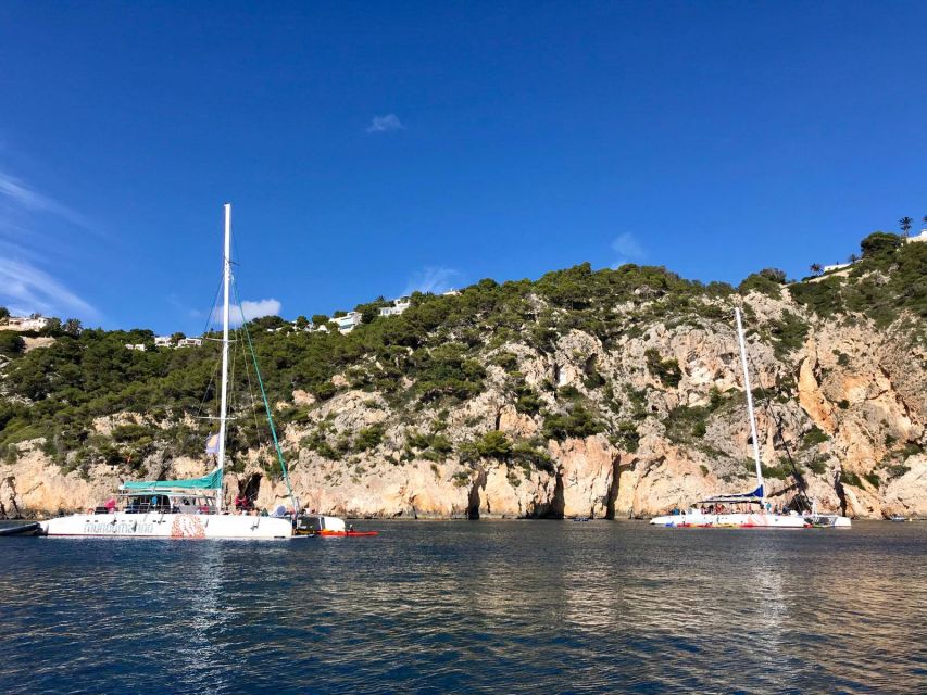 Dénia & Jávea: Portixol Sailing Catamaran Excursion with BBQ - The cove stop and swimming time