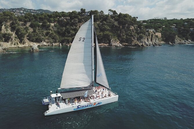 Departure in Catamaran young atmosphere at noon - What the Costa Brava catamaran experience is really like